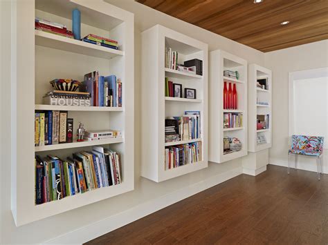 Floating Book Shelves In A Home Office Built By Birkholz Homes Home