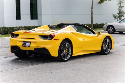 Grigio titanio metallic exterior with rosso ferrari interior. Used 2017 Ferrari 488 Spider For Sale ($259,000) | Marino Performance Motors Stock #223830