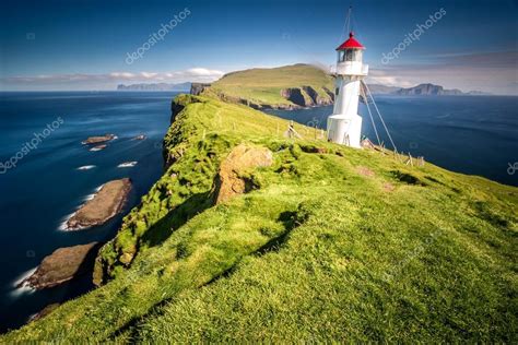 Lighthouse On Mykines Faroe Islands Stock Photo By ©fedevphoto 91453444