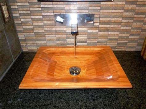 The use of the wooden sinks in bathroom place is a smart option for every elegant bathroom. Fascinating Wooden Bathroom Sinks to Create a Classic Style