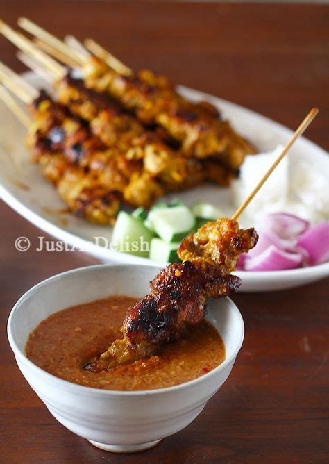satay grilled marinated skewered meat with spicy peanut sauce the epitome of malaysian food