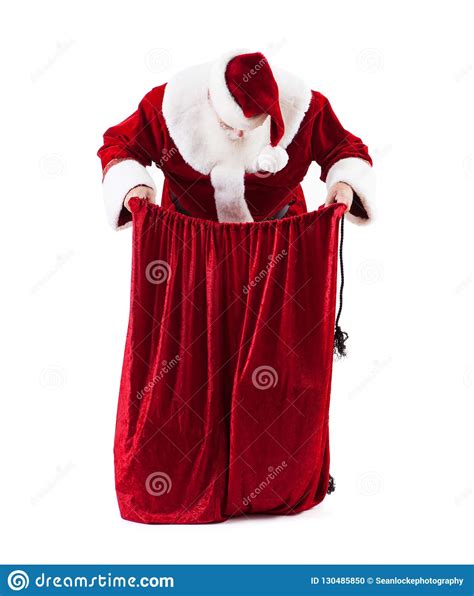 Santa Claus Looks Down Into Bag Of Ts Stock Photo Image Of