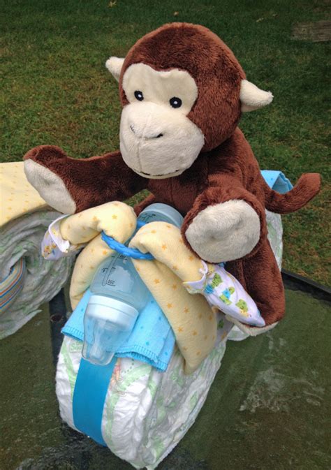Motorcycle tricycle diaper cake | baby diaper cake moto atv (tutorial) in this video you will learn step by step how to make a. How to Make a Motorcycle Diaper Cake - Mommy's Fabulous Finds