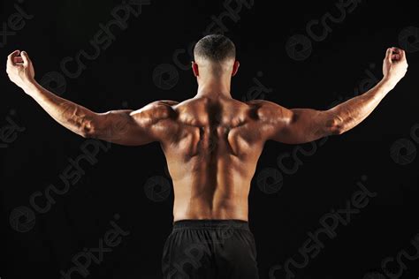Male Bodybuilder Flexing Muscles Back View Stock Photo 600917