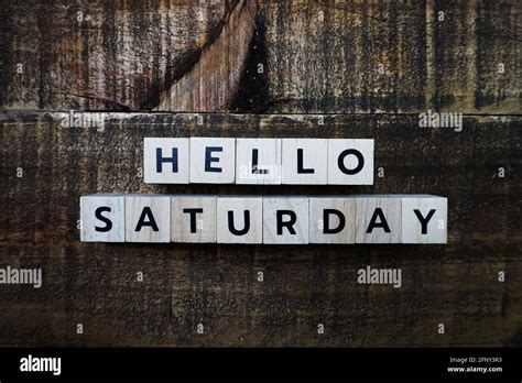 Hello Saturday Alphabet Letter With Space Copy On Wooden Background