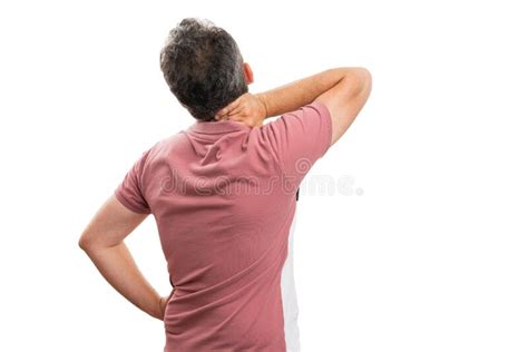 Male Having Muscle Pain Touching Neck Back To Camera Copyspace Stock