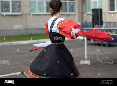 A Girl Dances Russian Folk Dance Performance Of A Girl With A Folk Dance On The Street Stock