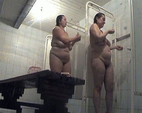 Two Fat White Bitches Unaware Of Hidden Voyeur Camera In The Shower