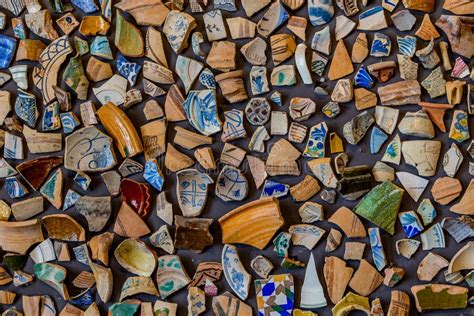 Background From Pieces Of Clay Colored Broken Pottery Decoration