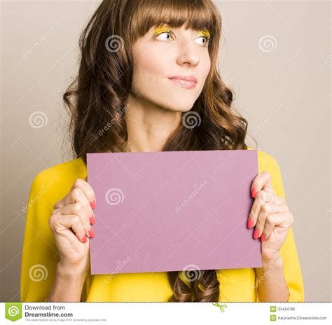 Maybe you would like to learn more about one of these? Woman Holding Blank Card. Royalty Free Stock Image - Image: 34424786