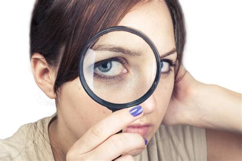 Girl Magnifying Glass Over Her Face Stock Photos Free And Royalty Free