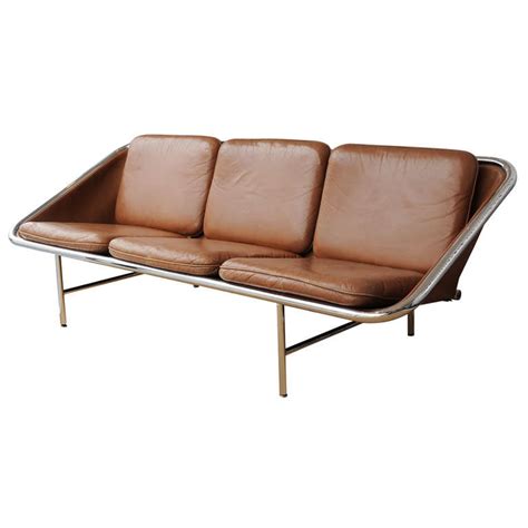 Brown leather with stainless steel frame. George Nelson Sling Sofa at 1stdibs