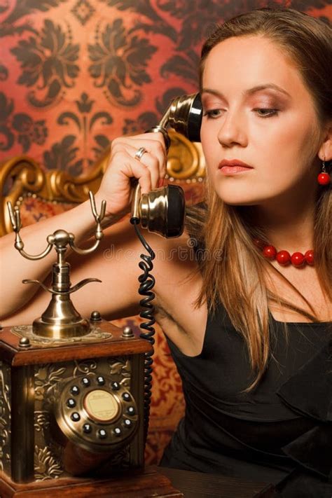 Woman On Vintage Chair And Talking On Old Phone Stock Photo Image Of