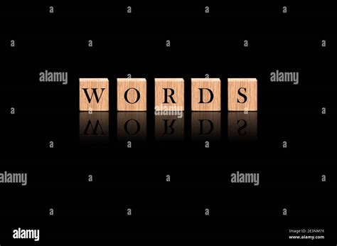 The Word Words Mad By Wood Blocks In Solid Black Background Stock
