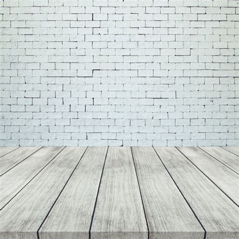 Wooden Floor And White Brick Wall For Texture Background Stock Photo