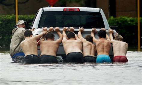 This Is What A True American Looks Like Everyone Joins In Pushing A Pick Up Truck Out Of Deep