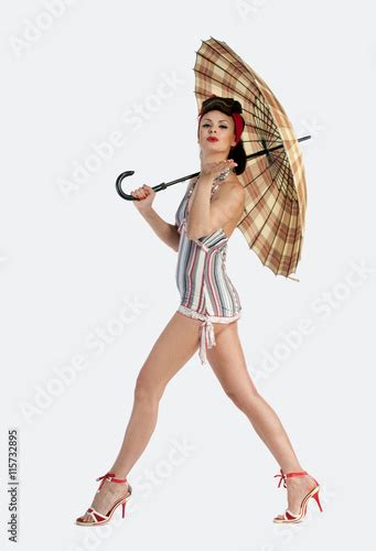 Pin Up Woman With Umbrella Stock Photo And Royalty Free Images On