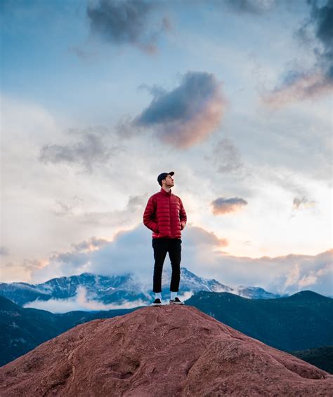 Standing On A Mountain Pictures Download Free Images On Unsplash