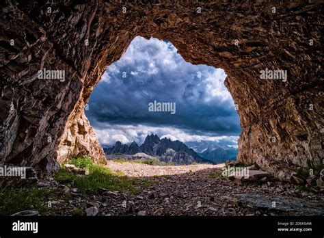 The Mountain Group Cadini Di Misurina Seen Out Of A Cave Above The