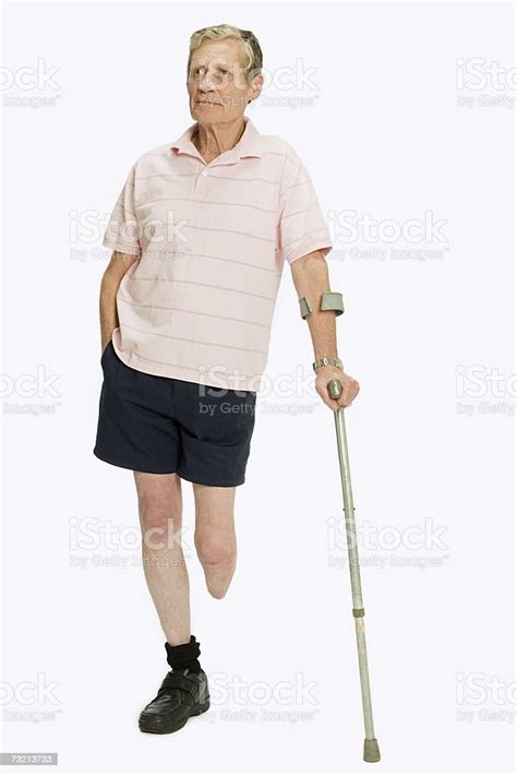 Male Amputee Using Crutches Stock Photo Download Image Now Amputee