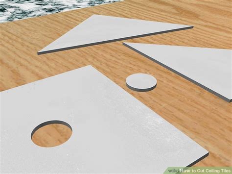 The tiles cut easily with a utility blade, so it's just a matter of measuring your space, marking your tiles with a we even stuck the tiles to our access panel, to make it blend in with the ceiling a bit more How to Cut Ceiling Tiles: 8 Steps (with Pictures) - wikiHow