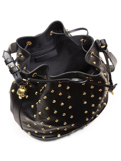 Lyst Alexander Mcqueen Studded Leather Bucket Bag In Black