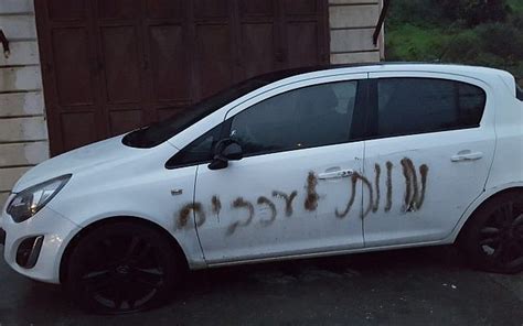 Death To Arabs Graffitied On Cars In Palestinian Village The Times Of Israel