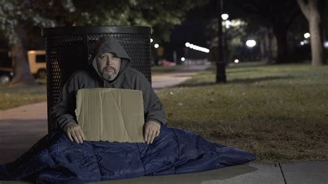 Homeless Man In Outdoor Cold Sitting On Sidewalk 4k Stock Video Footage