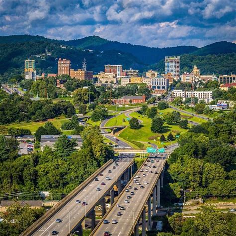 There are meandering paths, several areas for quiet reflection or enjoying time with others, a small pond, and beautiful flower beds. Who is Asheville, N.C.'s doppelgänger city? | AVLtoday