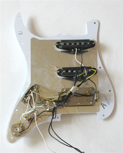One complaint about an hss strat is that in position 2, the humbucker sonically overwhelms the middle pickup. Fender American Deluxe Stratocaster Hss Wiring Diagram Rate Guitar - Fender Hss Wiring Diagram ...