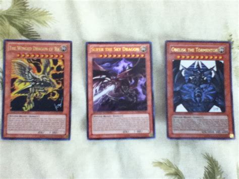 Slifer the sky dragon and egyptian god deck: My Three God Cards by jkphantom9 on DeviantArt