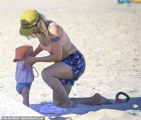 Ed Sheeran Looks Every Inch The Doting Father As During Beach Day With