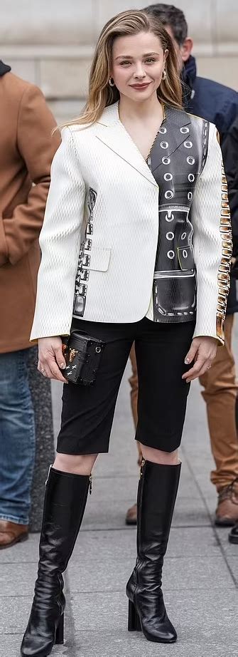 Who Made Chloe Grace Moretzs White Jacket Black Boots And Sequin