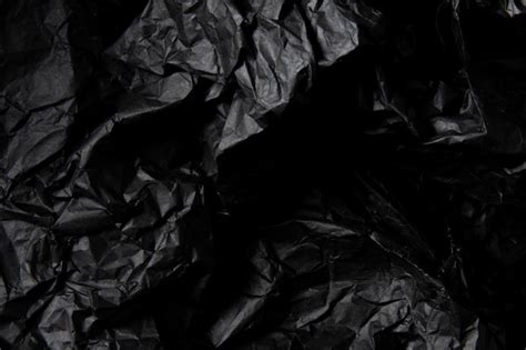 Premium Photo Crumpled Black Paper Texture