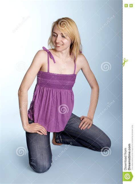 Woman On Her Knees Looking Awa Picture Image