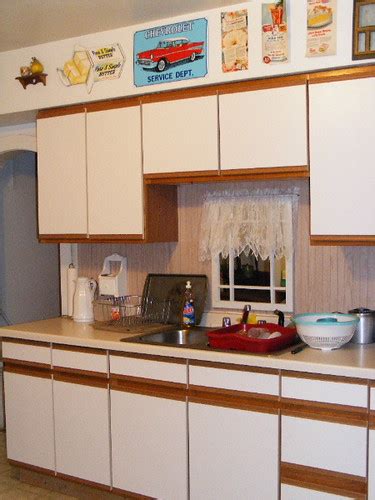 Too much of a chore to take it down too expensive to replace with we want to paint laminate kitchen cabinets, but we want them to look good! Ugly kitchen cabinets | Flickr - Photo Sharing!