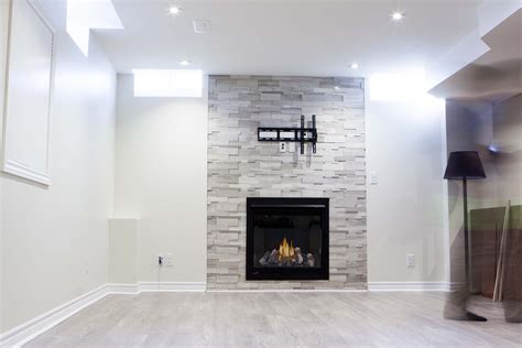 25 Basement Remodeling Ideas And Inspiration Basement Fireplace Tv