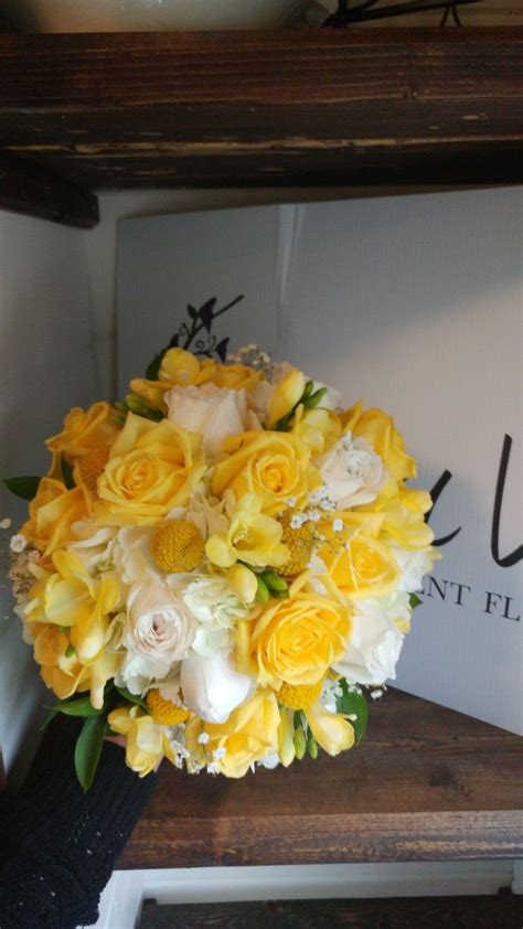 Dried, silk, foam or plastic flowers all offer a reliable alternative to fresh flowers. Yellow rose bouquet with freesia, craspedia, and ...