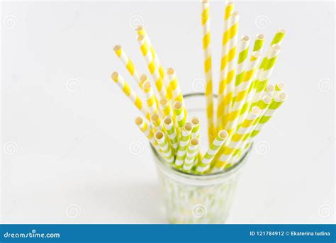 Colorful Straws Yellow And Green Straws In Glass White Background Copy
