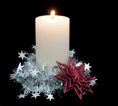 Photo of burning festive candle | Free christmas images