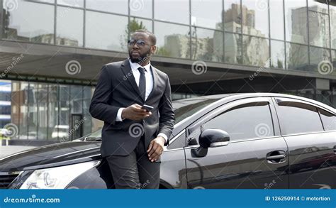 Personal Driver Meeting And Opening Car Door For Lady Boss Bodyguard