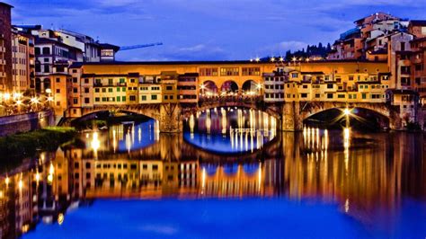 Ponte Vecchio Bridge And The Arno River At Dusk Backiee