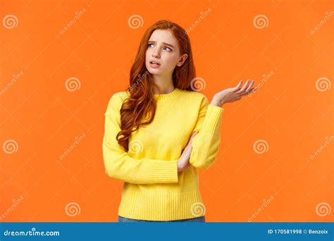 Troubled And Unsure Indecisive Cute Redhead Girl Trying Solve Problem Searching Resolve