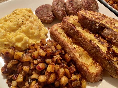 Homemade Scramby Eggs Sausage Home Fries And Sourdough French Toast