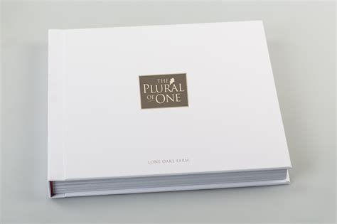 The covers of these books are extremely important because the subject matter might be uncommon and in need of an decorative enhancement to spark. 'A Plural of One' Hardcover Coffee-Table Book Published