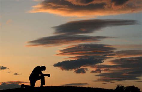 3000 Man Kneeling In Prayer Stock Photos Pictures And Royalty Free
