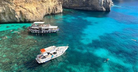 Malta Around Comino Blue Lagoon Crystal Lagoon And Caves Getyourguide