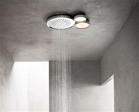 With a handheld shower head, you can sit on the bench and still shower, moving the water around you as you stay stationary. Water Lily Illuminated Shower Head | Fixed Shower Heads