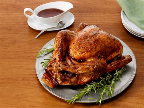 Is thanksgiving really complete without stuffing on the table? Pomegranate-Glazed Turkey With Wild Rice Stuffing Recipe ...