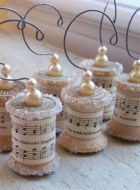 Ornaments Made From Vintage Spools With Music Paper Christmas Ornaments